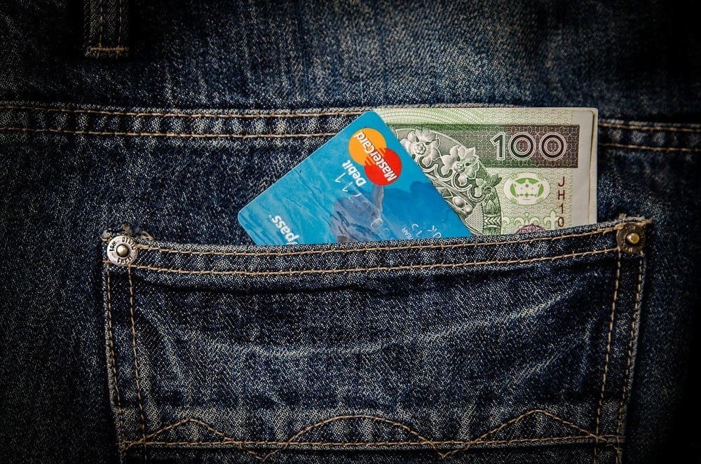 when traveling, keep an extra credit card and money in a pocket away from the rest of your valuables.