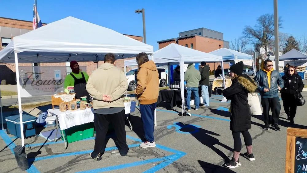 Beacon's sunday morning farmers' market is busy,even on a cold winter day.