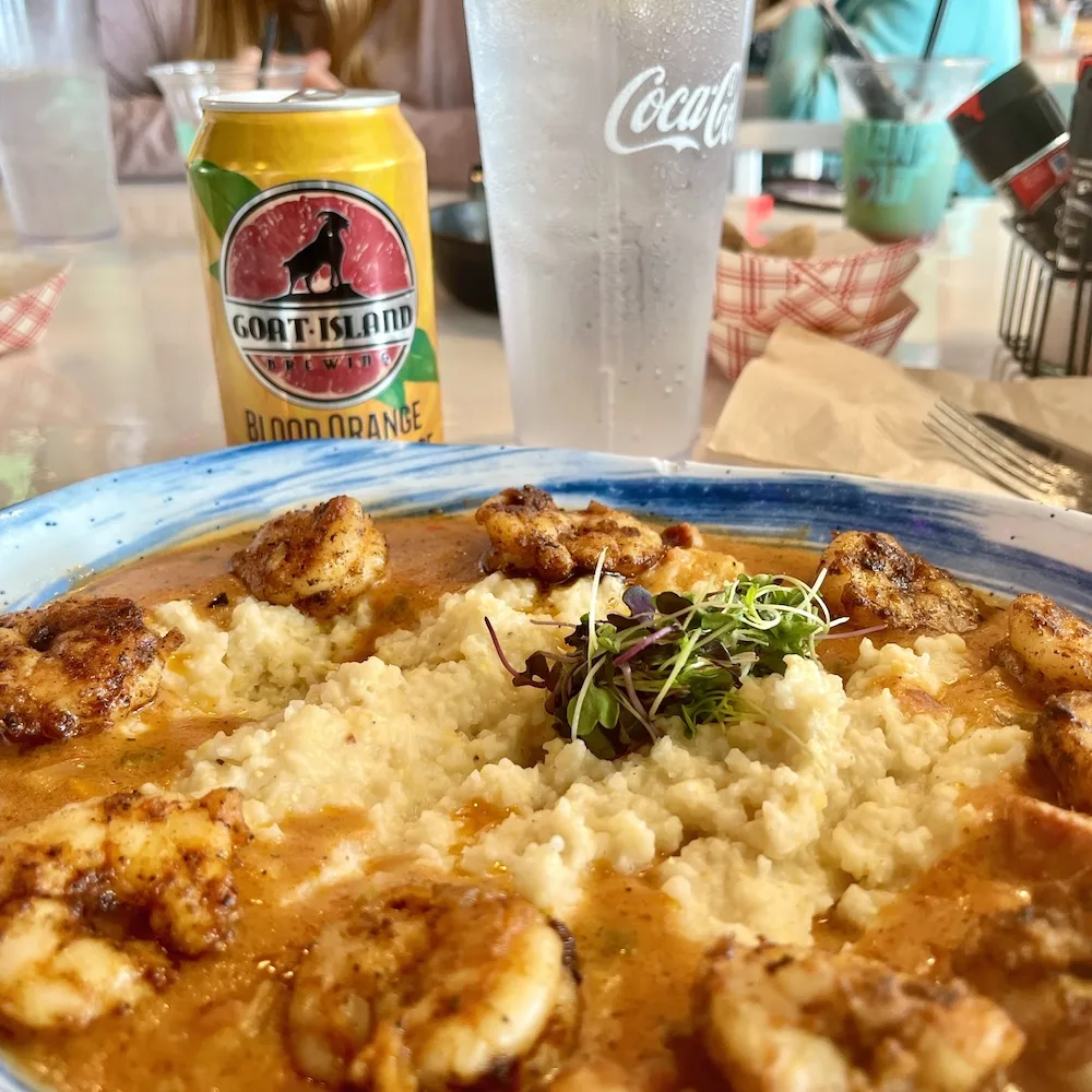 Shrimp and grits with a local blood orange wheat beer at the hangout at gulf shores