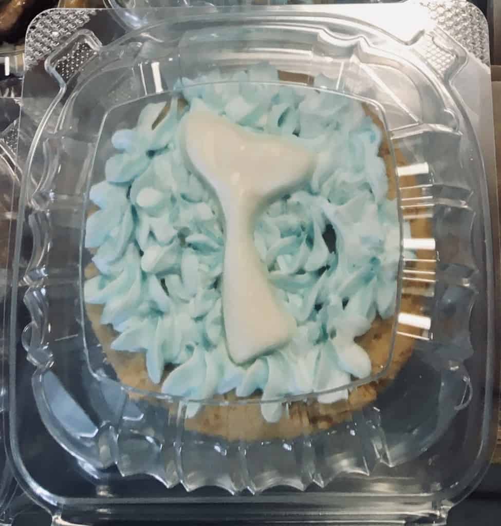 A whale tale cookie with blue icing at southern grind.