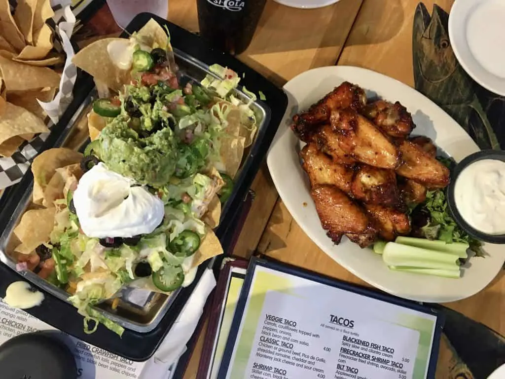 Nachos and wings at yoho rum & taco.