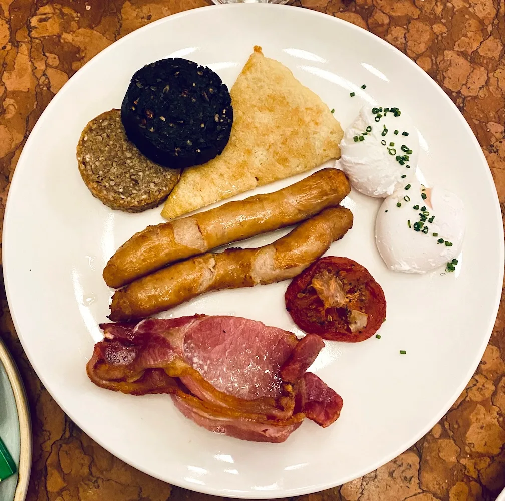 At bewley's café on grafton street the full irish breakfast comes with poached eggs.