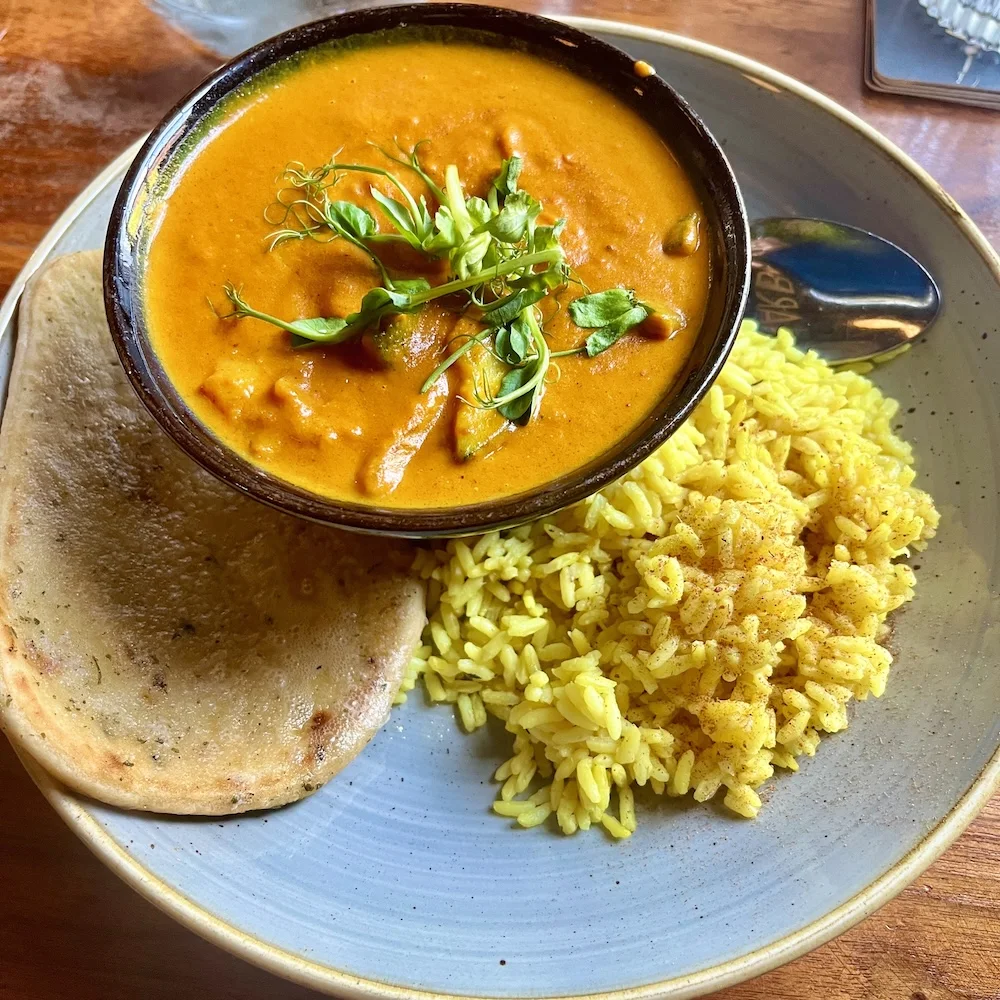 Shrimp curry at dublin's harbourmaster comes with yellows rice and naan.