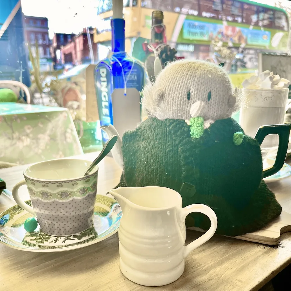 Amusing tea cozies are just one of the homey touches at the irish potato cake company.