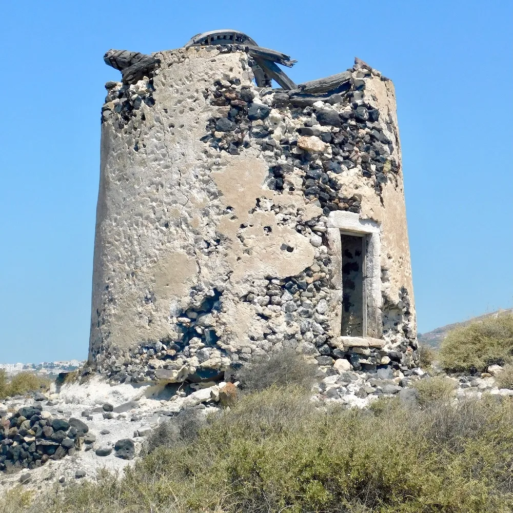 the ruins of old windmills are another hidden away sight on santorini.
