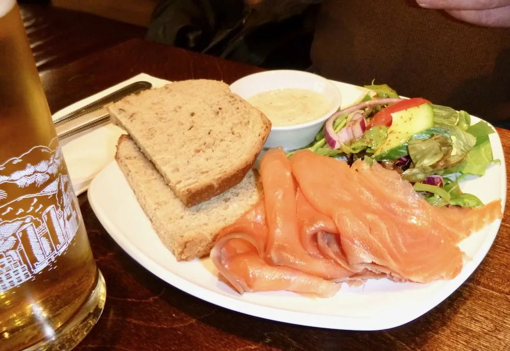 smoked salmon and brown bread is an example of the local ingredients edinburgh's albanach pub favors in