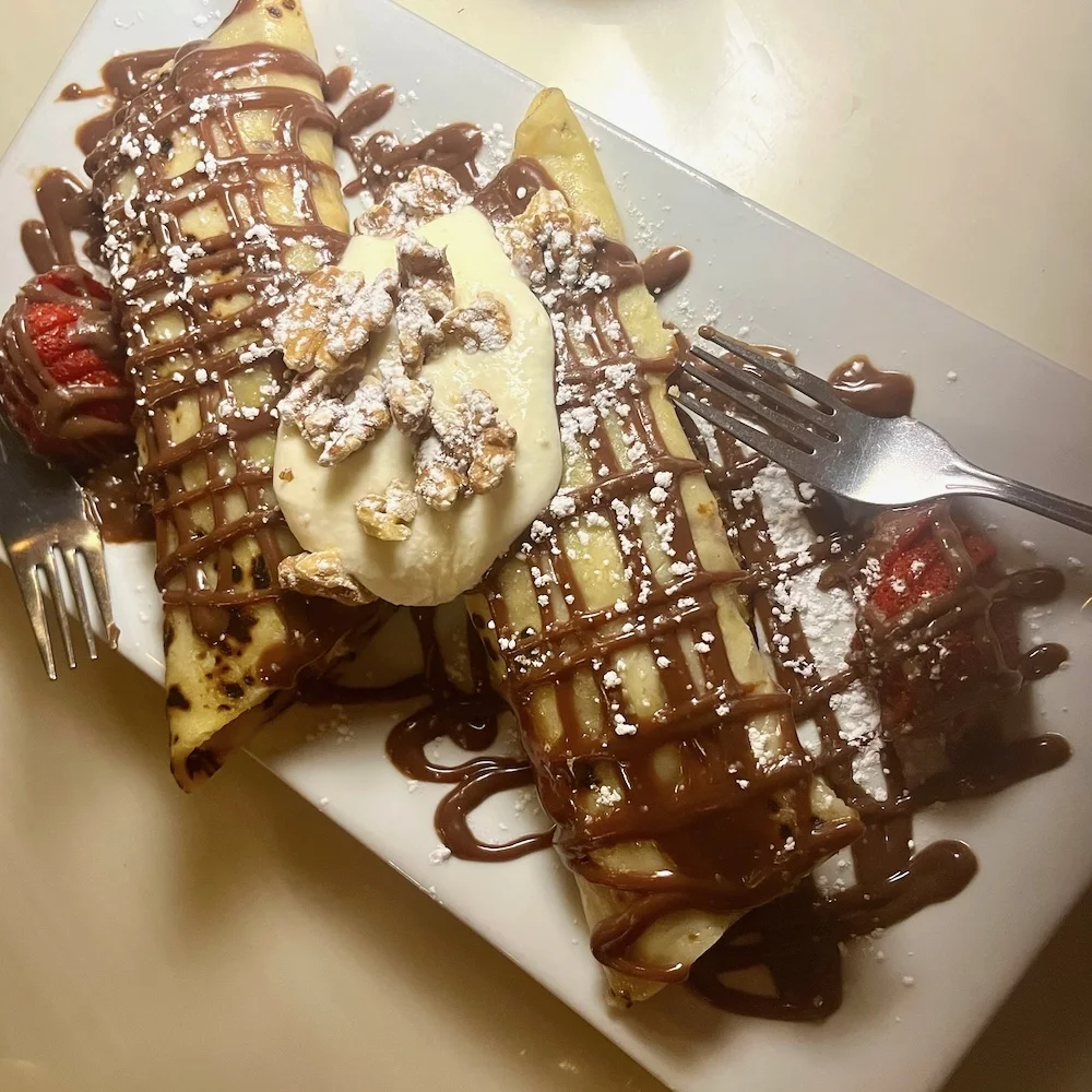 chocolate-covered strawberry crepes are a nice finish to a romantic dinner at benelux in saratoga springs