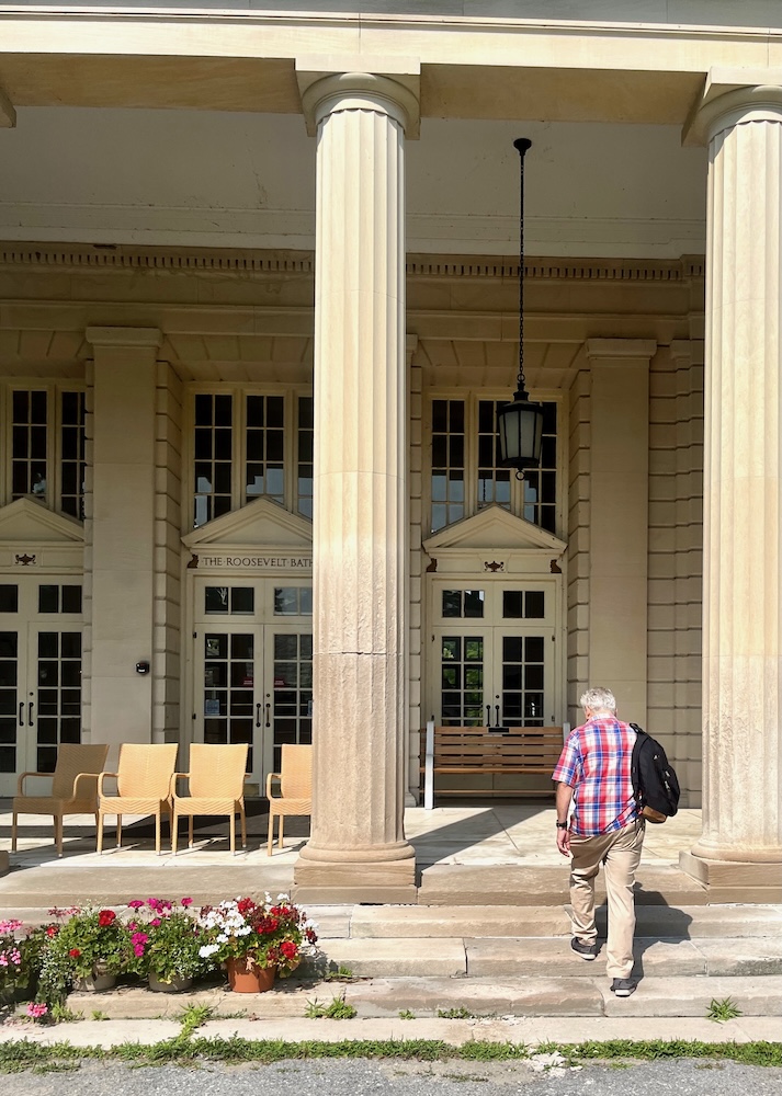 the georgian portico at the roosevelt baths & spa tell you you're for an unusual experience. the mineral baths are a fun activity for a couples weekend in saratoga.